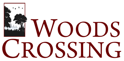 Woods Crossing Subdivision logo