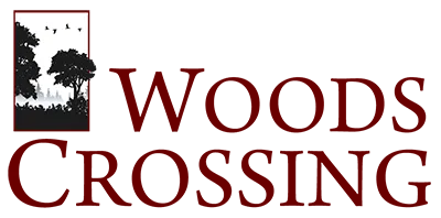 Woods Crossing Subdivision logo